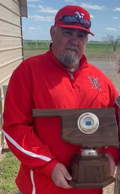 Mr. McCombs with Shooter Sports State Champions trophy.